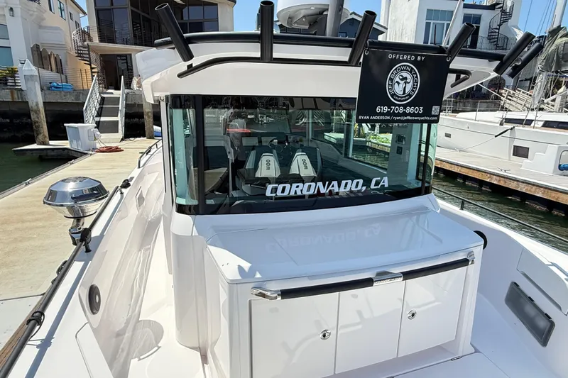Slide: The Image of 2022 Axopar 37 XC Cross Cabin docked in Coronado, CA marina. - 8