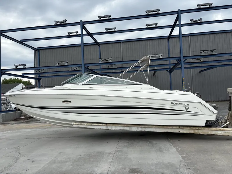 The Image of 2004 Formula 280 Bow Rider boat on a trailer. - 1