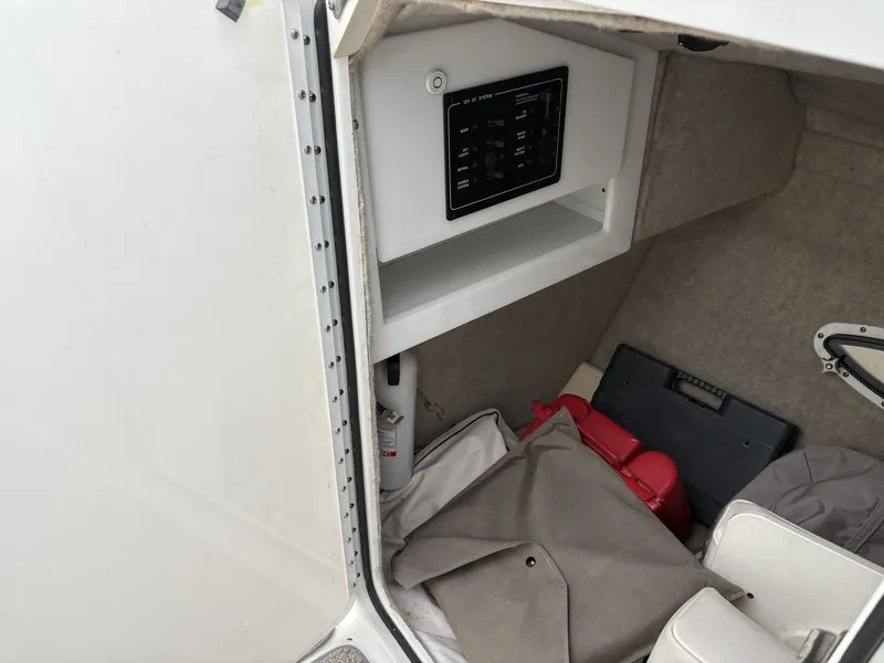 Slide: The Image of Interior of a 2004 Formula 280 Bow Rider boat with storage area. - 11