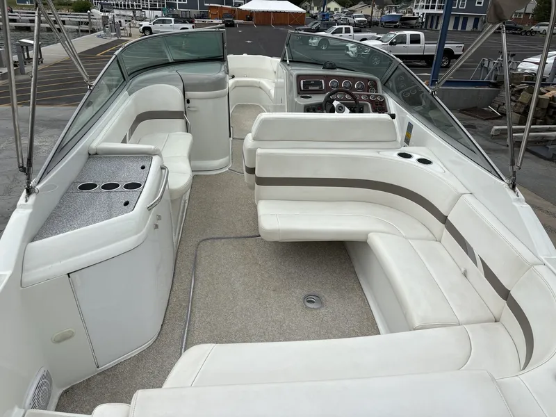 Slide: The Image of Interior of a 2004 Formula 280 Bow Rider boat with white seating. - 14