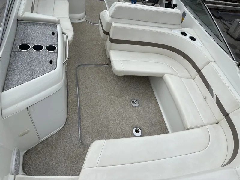 Slide: The Image of Interior of a 2004 Formula 280 Bow Rider boat with seating area. - 16
