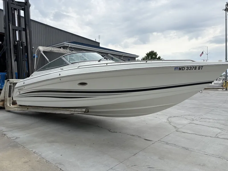 Slide: The Image of 2004 Formula 280 Bow Rider boat on a dry dock. - 27