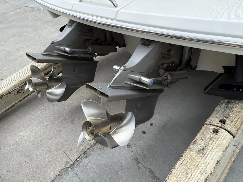 Slide: The Image of 2004 Formula 280 Bow Rider boat engines on wooden blocks. - 5