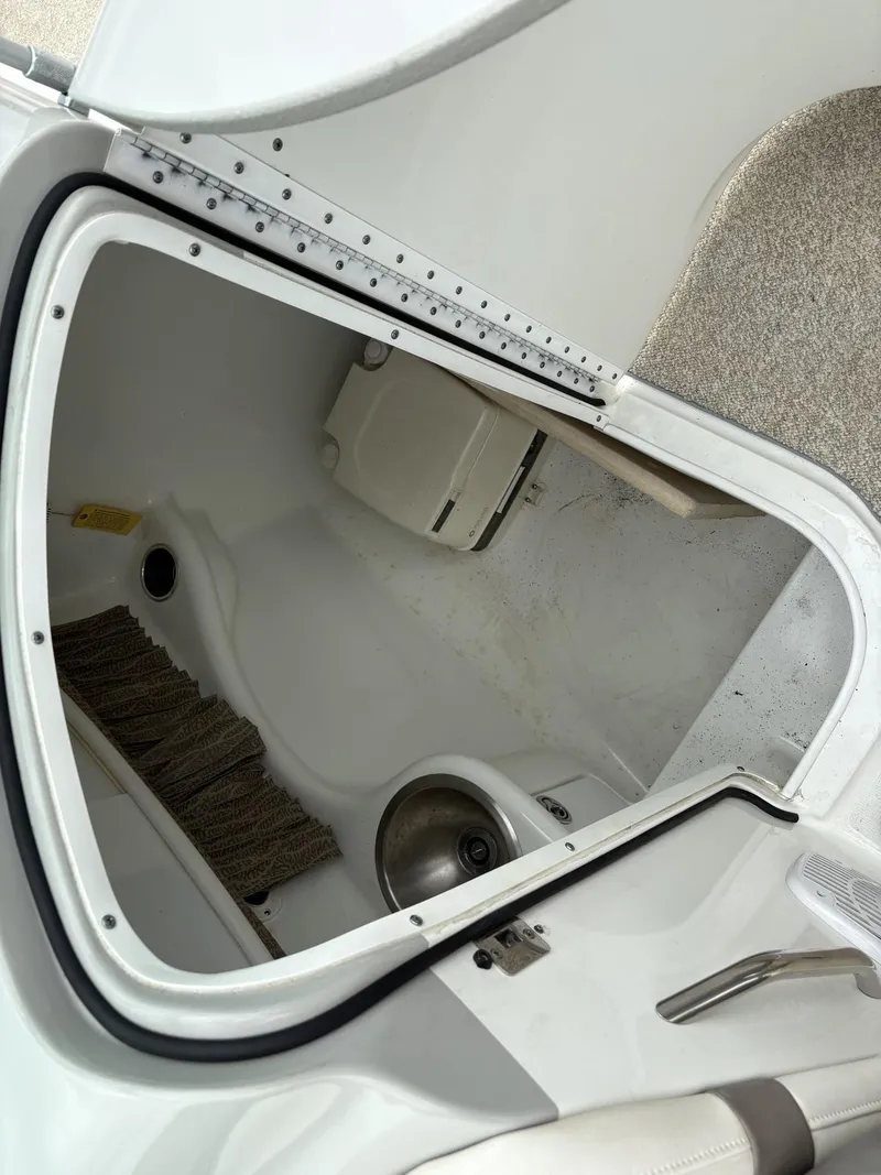 Slide: The Image of Interior of a 2004 Formula 280 Bow Rider with toilet and sink. - 9