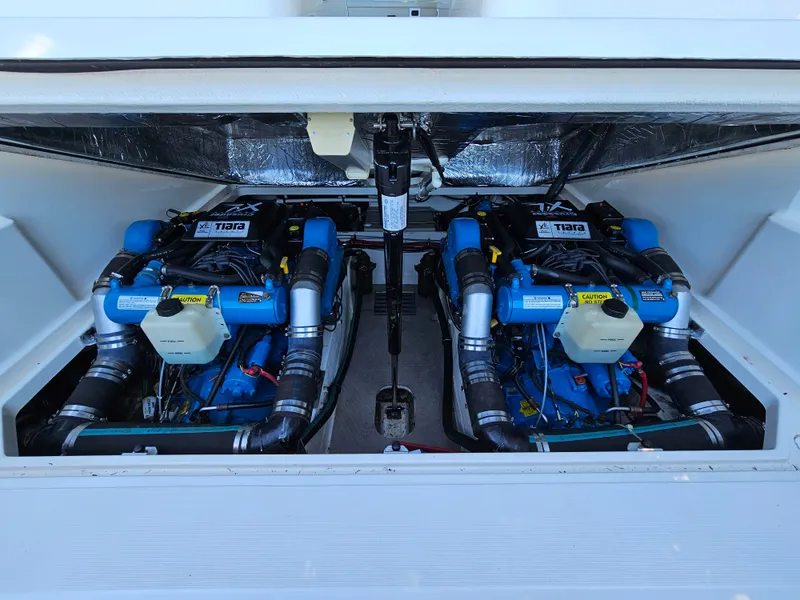 Slide: The Image of Engine compartment of 1997 Tiara Yachts 2900 Coronet with dual engines. - 14