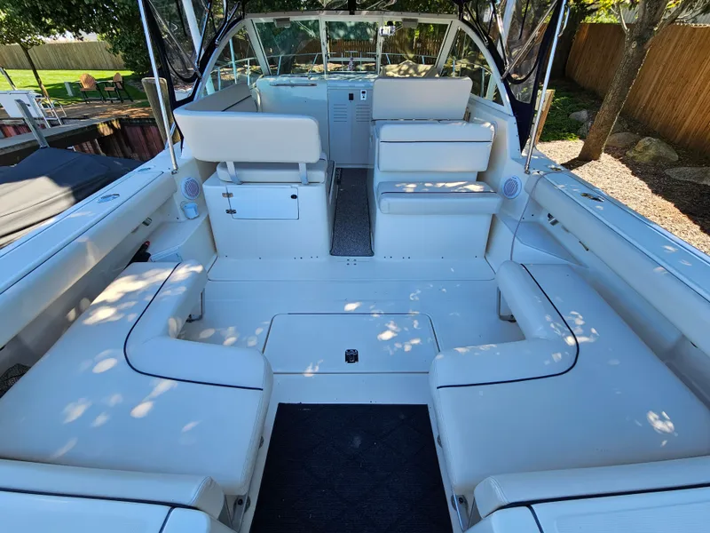 Slide: The Image of Interior of a 1997 Tiara Yachts 2900 Coronet with white upholstery. - 2