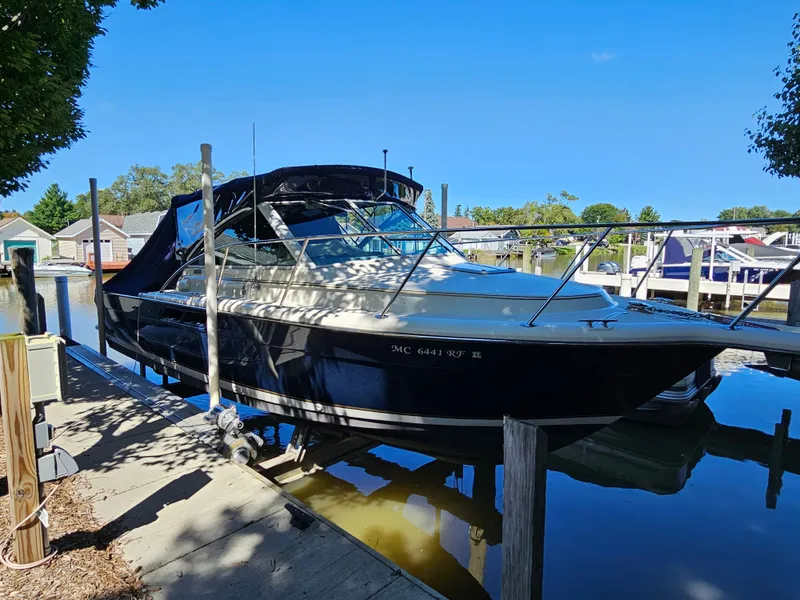 Slide: The Image of 1997 Tiara Yachts 2900 Coronet docked on a sunny day. - 6