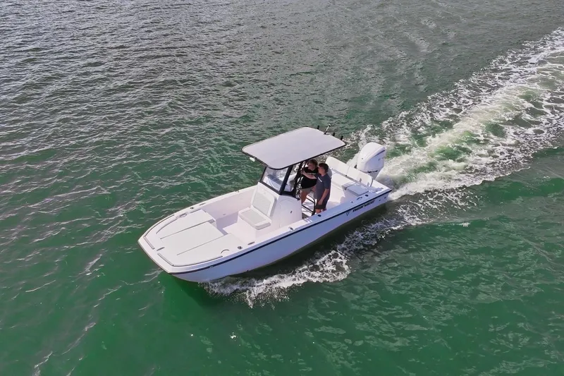 Slide: The Image of 2026 Twin Vee 22 BayCat cruising on open water, showcasing sleek design and performance. - 3