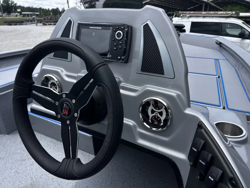 Slide: The Image of Steering wheel and dashboard of Xpress H17 boat, year 2026. - 12