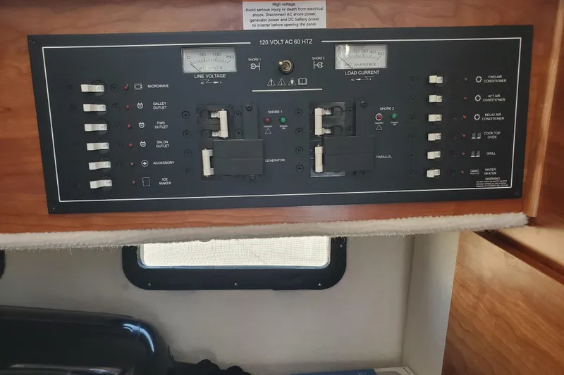 Slide: The Image of Electrical control panel on a 2024 Cutwater C-30 CB boat. - 18