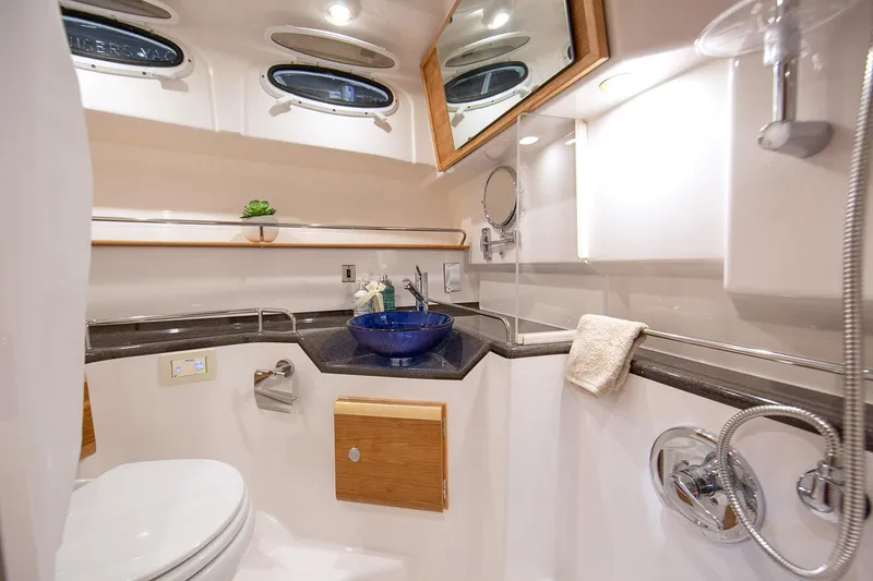 Slide: The Image of Manufacturer Provided Image: 2024 Cutwater C-30 CB yacht bathroom with modern fixtures and elegant design. - 32