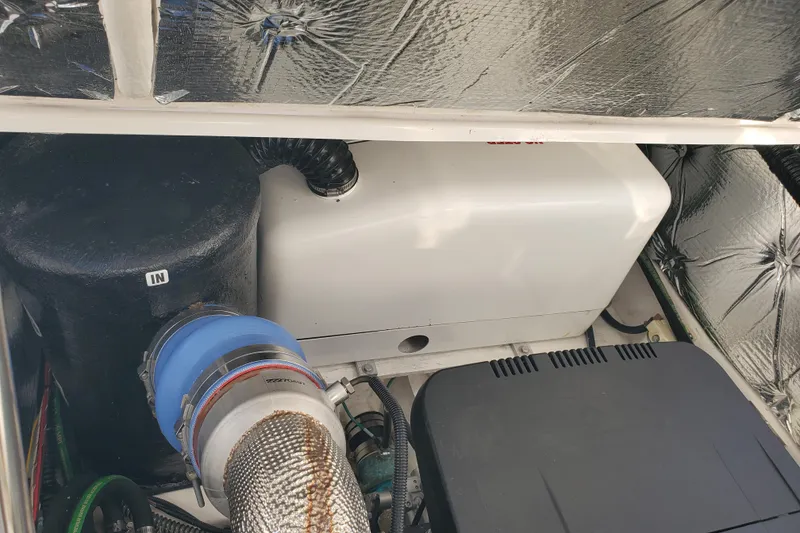 Slide: The Image of 2024 Cutwater C-30 CB engine compartment with insulated components and ventilation system. - 36