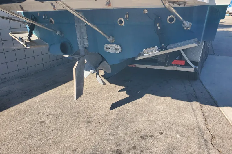 Slide: The Image of 2024 Cutwater C-30 CB boat stern with propeller and rudder detail. - 40