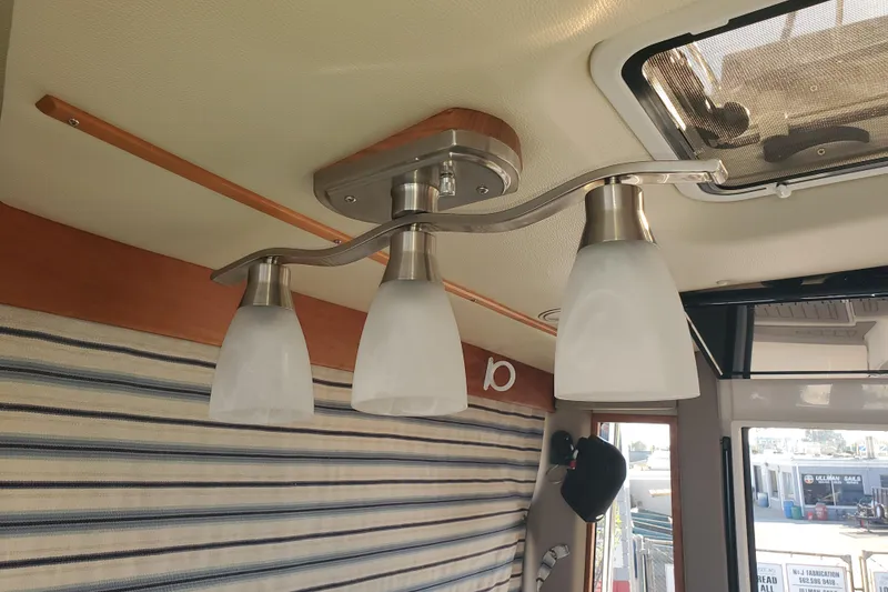 Slide: The Image of Ceiling light fixture inside 2024 Cutwater C-30 CB boat cabin. - 6