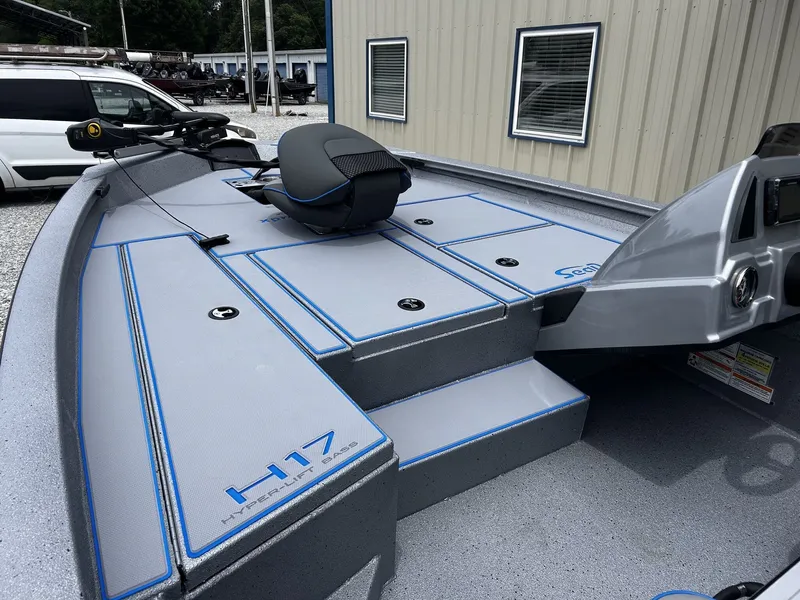 Slide: The Image of 2026 Xpress H17 boat with gray deck and blue accents. - 5
