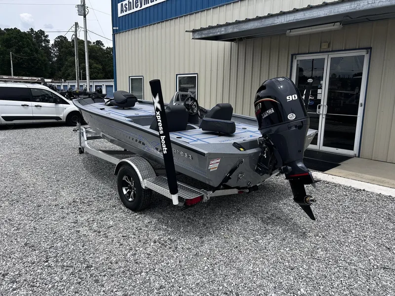 Slide: The Image of 2026 Xpress H17 boat with Yamaha motor on trailer. - 7