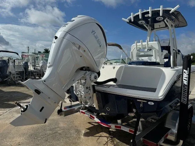 Slide: The Image of Pathfinder 2400 Open 2025 with Yamaha outboard motor on trailer. - 15
