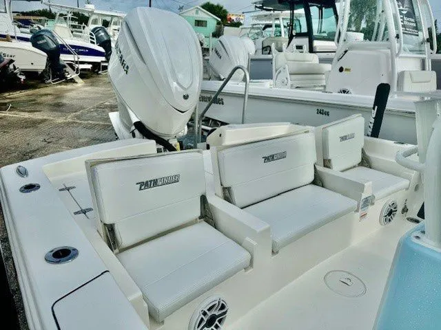 Slide: The Image of Pathfinder 2600 TRS 2025 boat with luxurious seating at the dock. - 6
