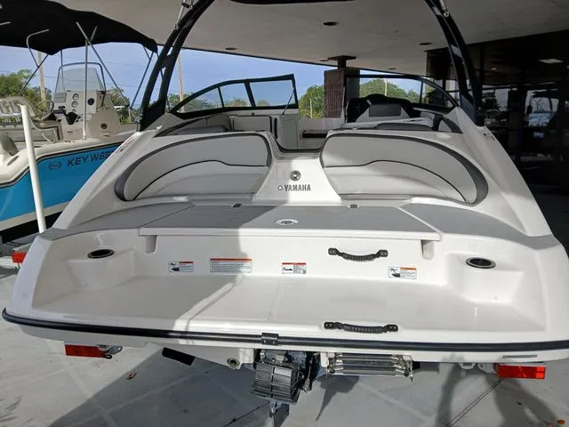 Slide: The Image of Rear view of a 2026 Yamaha Boats AR190 with gray seating. - 9