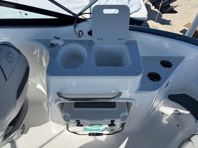 Slide: The Image of Interior of 2026 Hurricane SunDeck 2400 OB with sink and storage. - 6