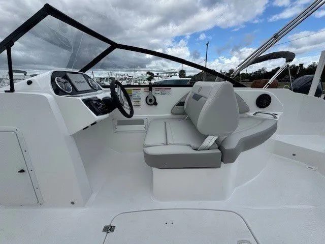 Slide: The Image of Interior of 2026 Hurricane SunDeck 235 OB with gray seating. - 6