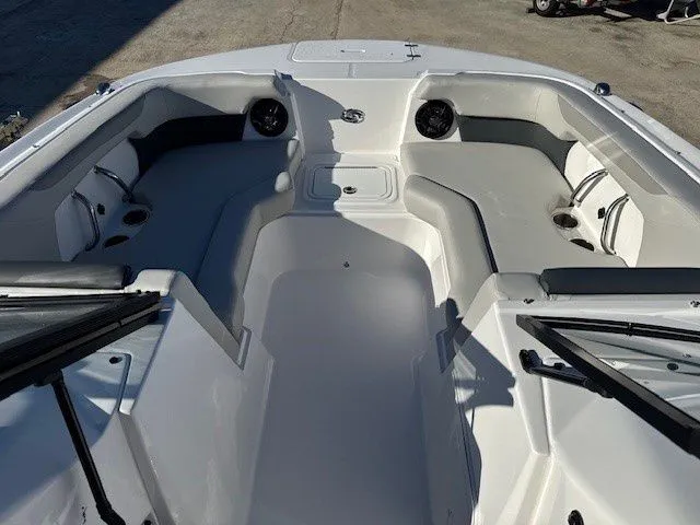 Slide: The Image of 2026 Hurricane SunDeck 2050 OB boat interior seating area. - 43