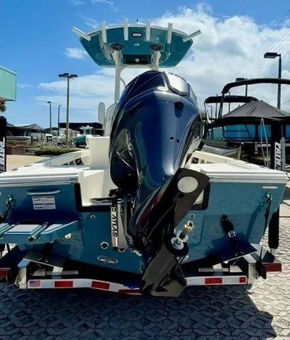 Slide: The Image of 2026 Pathfinder 2200 TRS boat with outboard motor on trailer. - 29