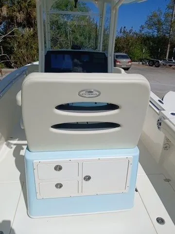Slide: The Image of Cobia 240 Center Console 2022 with helm station and storage. - 11
