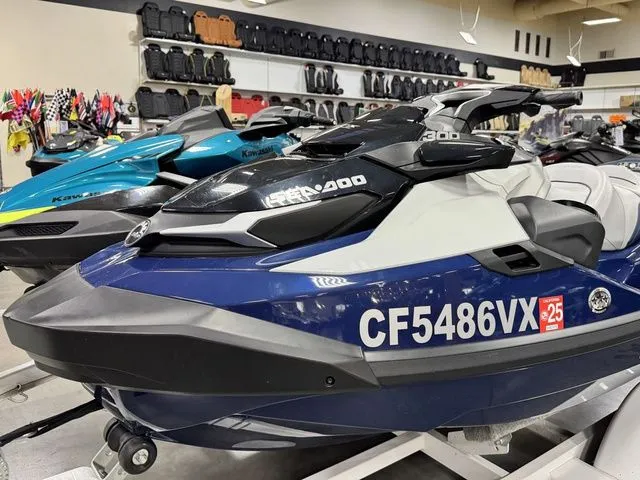 Slide: The Image of 2024 Sea-Doo GTX jet ski displayed in a showroom. - 6