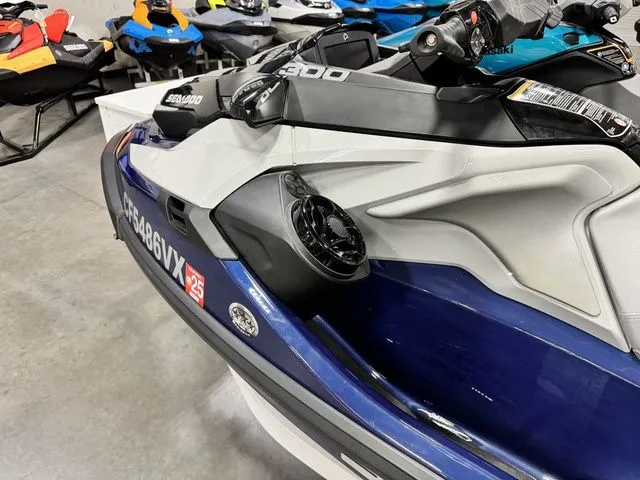 Slide: The Image of 2024 Sea-Doo GTX jet ski displayed in showroom. - 7