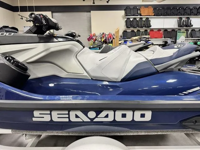 Slide: The Image of 2024 Sea-Doo GTX jet ski displayed in a showroom. - 8