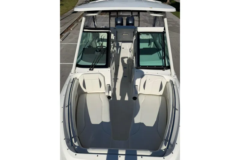 Slide: The Image of 2021 Pursuit DC 266 Dual Console boat interior, featuring spacious seating and modern design. - 30