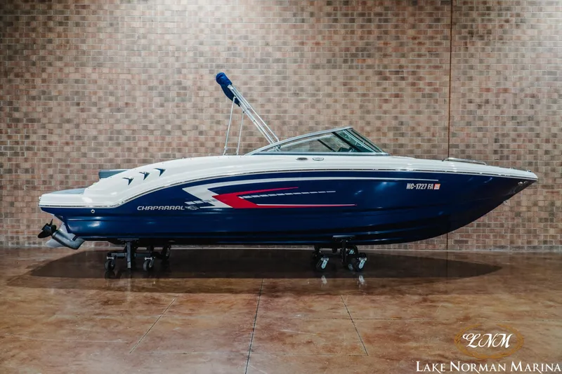 The Image of 2023 Chaparral 23 SSi boat displayed indoors at Lake Norman Marina. - 1