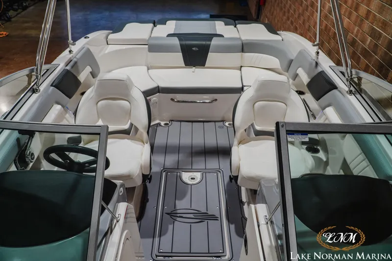Slide: The Image of 2023 Chaparral 23 SSi boat interior with white seating, Lake Norman Marina. - 17