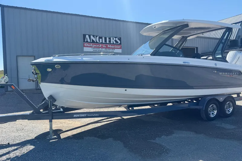 Slide: The Image of 2025 Monterey Elite 27 OB boat on trailer at Angler's Outpost & Marine. - 3