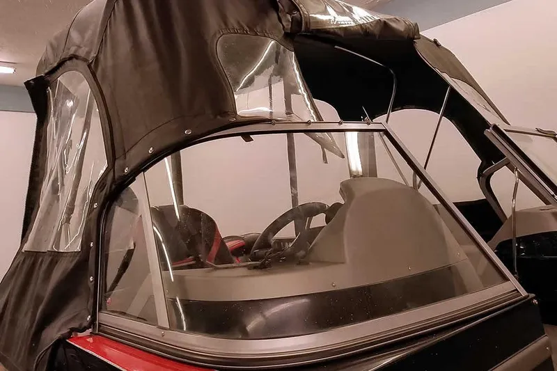 Slide: The Image of 2024 Ranger 621FS Fisherman boat with protective canopy and windshield. - 11