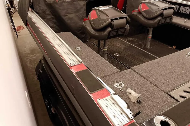 Slide: The Image of 2024 Ranger 621FS Fisherman boat interior with seating and storage compartments. - 12