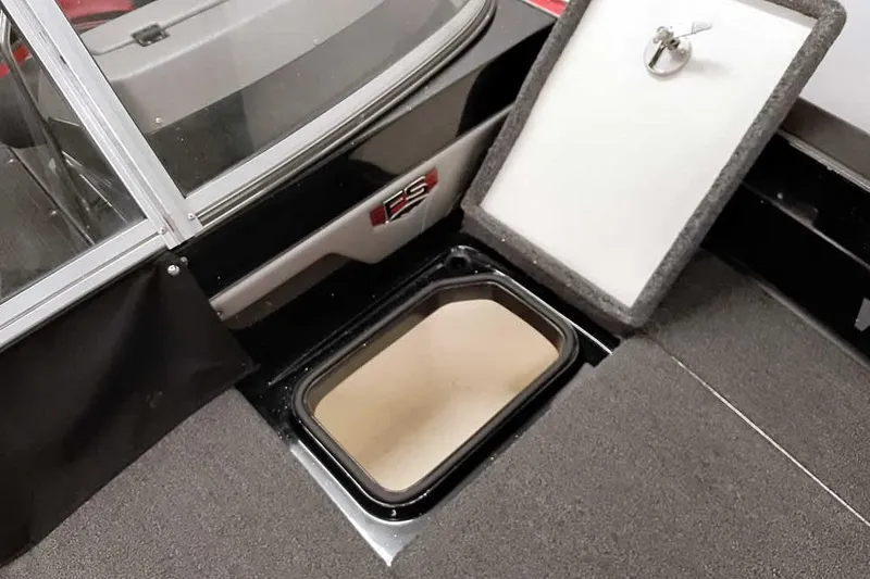 Slide: The Image of 2024 Ranger 621FS Fisherman boat storage compartment with open hatch, showcasing interior design. - 21
