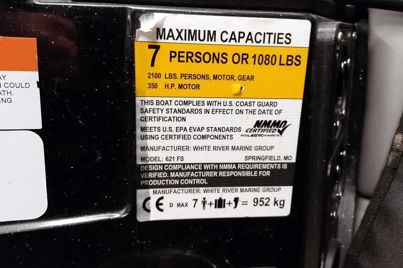 Slide: The Image of 2024 Ranger 621FS Fisherman capacity label: 7 persons or 1080 lbs, 350 HP motor. - 28