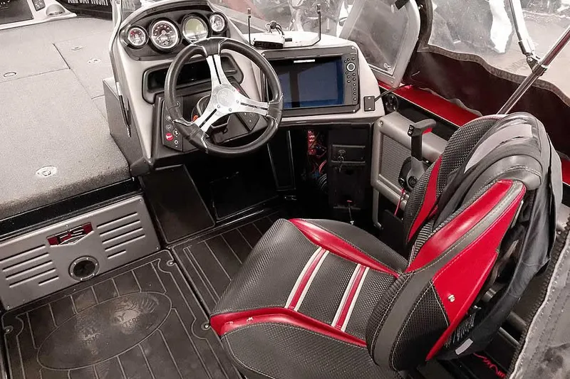 Slide: The Image of 2024 Ranger 621FS Fisherman boat interior with steering wheel and dashboard controls. - 29