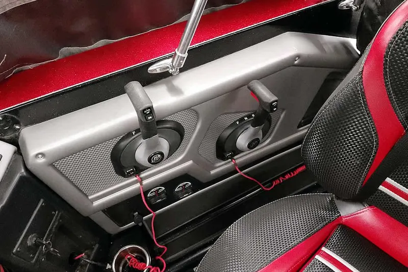 Slide: The Image of 2024 Ranger 621FS Fisherman boat interior with red and black seating and control panel. - 30