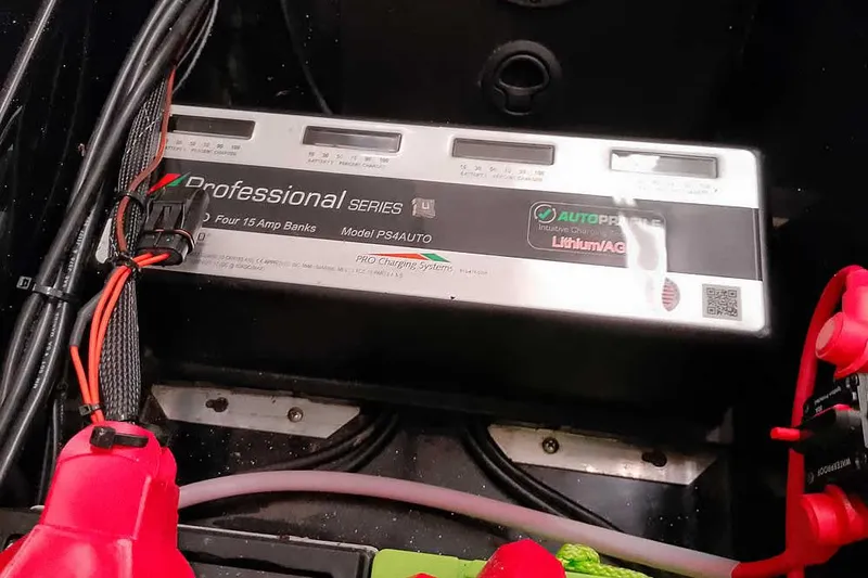 Slide: The Image of Battery charger in a 2024 Ranger 621FS Fisherman boat, featuring four 15 amp banks. - 34