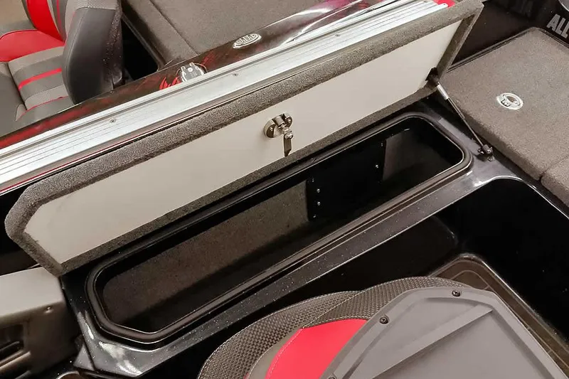 Slide: The Image of 2024 Ranger 621FS Fisherman boat storage compartment with open lid, showcasing interior space. - 35