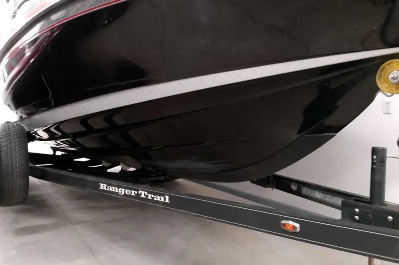Slide: The Image of 2024 Ranger 621FS Fisherman boat on Ranger Trail trailer in garage. - 5