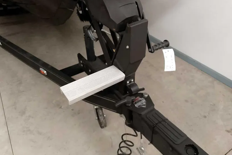 Slide: The Image of Trailer hitch of 2024 Ranger 621FS Fisherman boat, featuring a sturdy step. - 6