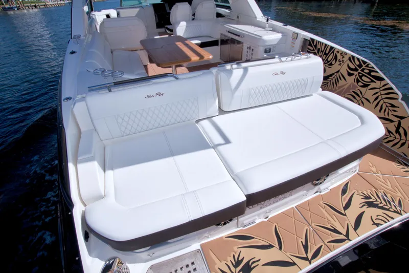 Slide: The Image of 2021 Sea Ray SLX 400 Outboard with luxurious seating and elegant deck design. - 17