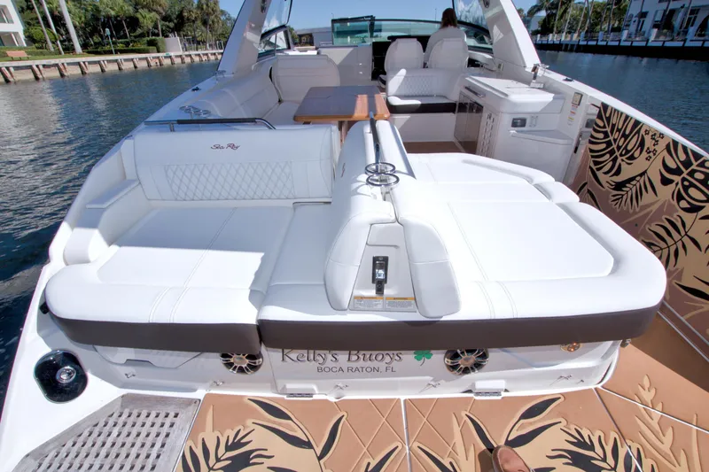 Slide: The Image of Luxurious 2021 Sea Ray SLX 400 Outboard boat with spacious seating and elegant design. - 18
