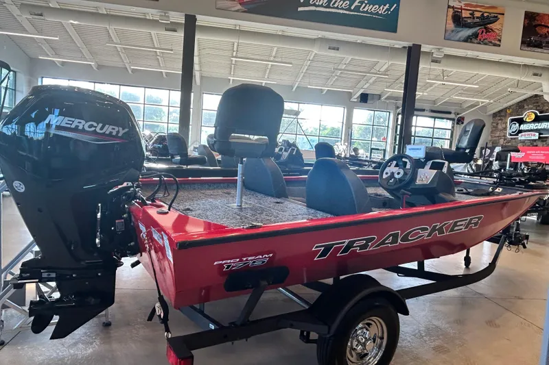 Slide: The Image of 2026 Tracker Pro Team 175 boat with Mercury engine in showroom. - 6