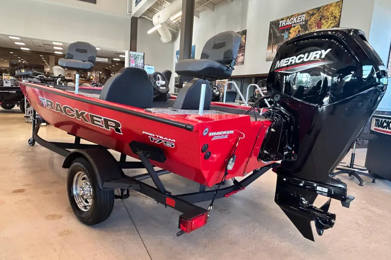 Slide: The Image of 2026 Tracker Pro Team 175 boat with Mercury engine in showroom. - 10