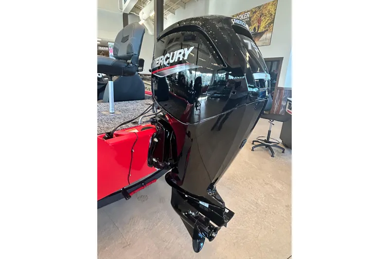 Slide: The Image of 2026 Tracker Pro Team 175 with Mercury outboard motor in showroom. - 8